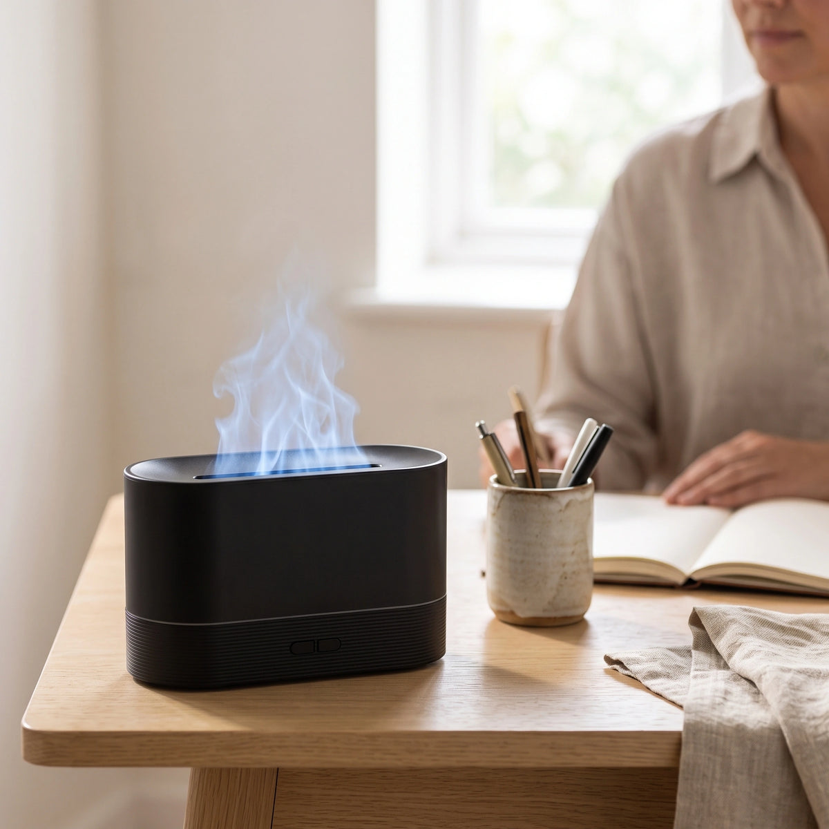 Diffuseur d’ambiance à effet flamme dans un bureau